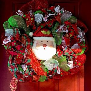 Santa clause wreath. Hang on the outside or inside of your door.Great condition